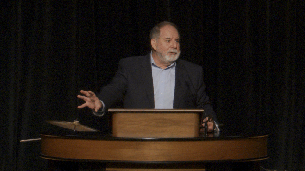 Todd Williams behind chapel podium