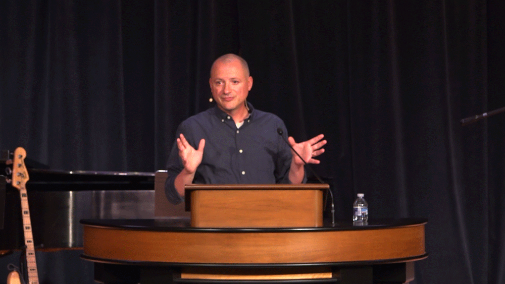 Mike Focht behind chapel podium